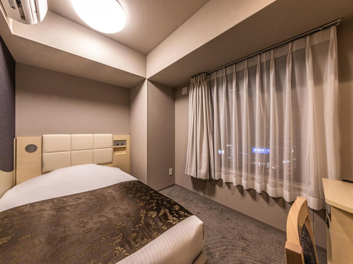 Apa Hotel Shin Osaka Eki Tower Exterior foto